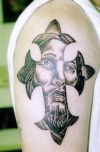 jesus and cross tattoo on arm